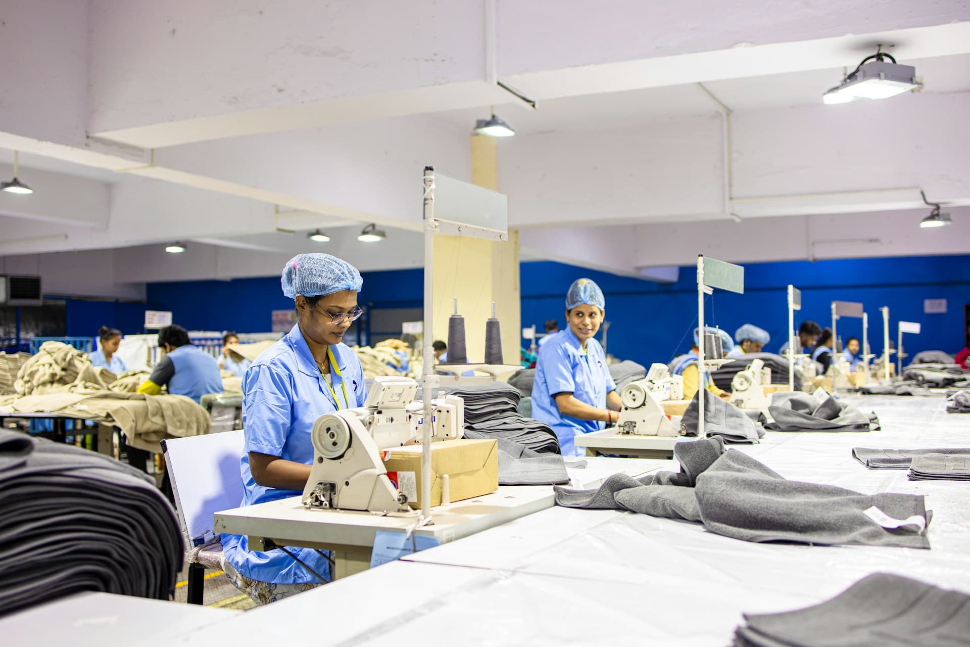 Rishabh Bags factory floor — workers at sewing machines